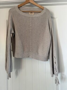 Hollister Women's Light Cream Knit Crewneck Sweater with Lace-Up Sleeves